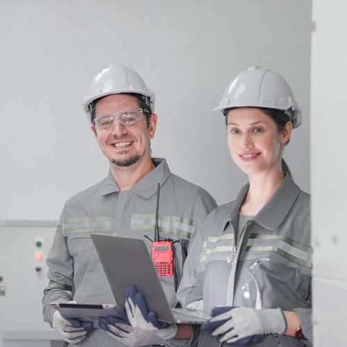 Professional engineer workers training and testing machine at industry factory. Concept people operation in industrial. Industry robot programming software for automated manufacturing technology.